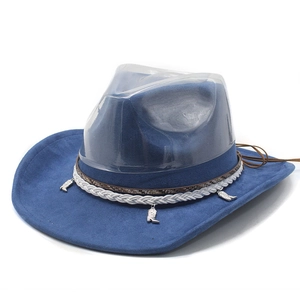 Detail of blue faux suede cowboy hat featuring white braided rope and silver boot charms