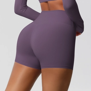 Close-up of seamless dark purple high-waisted yoga shorts with push-up lifting effect
