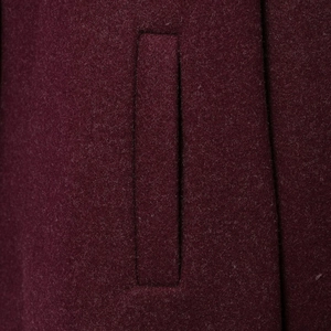 Retro loose lapel wool jacket in wine red showing textured pocket detail for women