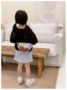 Detail of purple cartoon car shoulder bag on a child model in a cozy living room