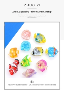 Detailed collection of acrylic marine hair clips with fish and shell patterns on white