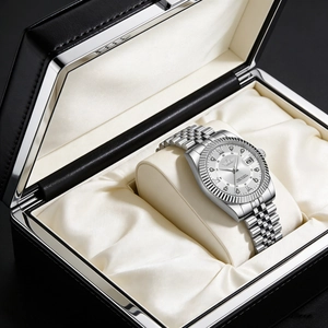 Silver luxury men's watch with white dial and date display in a black gift box