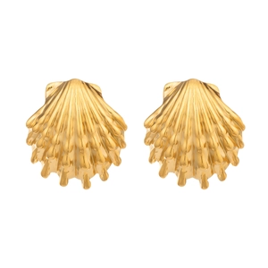 Macro shot of gold shell earrings showing detailed radial ridges and wave edges