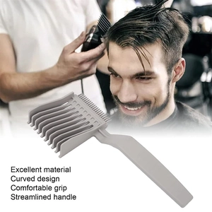 Professional curved barber fade comb with streamlined handle and ergonomic gray plastic design