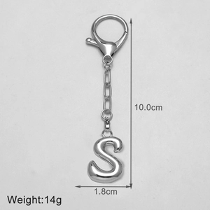 Detailed view of polished silver letter S keychain with lobster clasp and dimensions