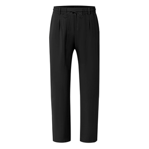 Detail of black linen lounge pants featuring adjustable drawstring waist and breathable fabric