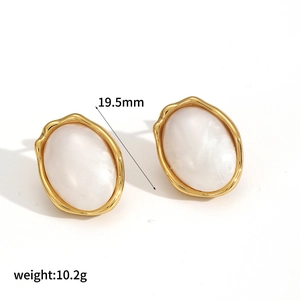 Detail showing vintage oval gold earrings with white inlay including 19.5mm size specs