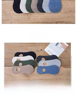 Close-up of cotton invisible boat socks in seven colors with fine ribbed knit texture