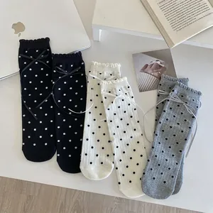 Polka dot socks with lace trim and ribbon bows in black, white and grey sets