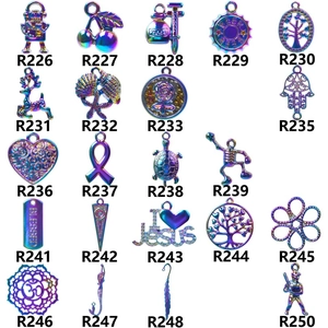 Detailed grid of iridescent rainbow zinc alloy charms including hearts, trees, and crosses