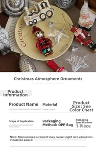 Macro shot of assorted Christmas astronaut ornaments and hand-painted festive decorations