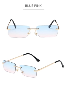 Detail of frameless sunglasses with blue-pink gradient lenses and gold metal frames
