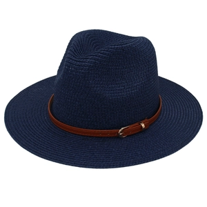 Navy blue Panama straw hat with a slim brown leather belt buckle and a classic Fedora shape
