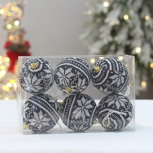 Set of 6 knitted Christmas tree ornaments with black and white snowflake patterns