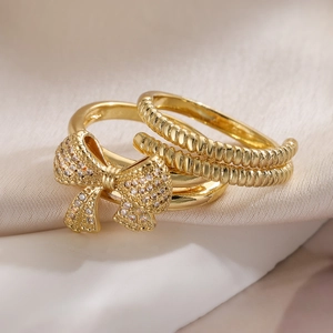 Elegant 18K gold-plated double-layer bow ring set with sparkling cubic zirconia accents