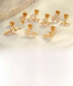 Detail of flower and star shape 1.2x6mm screw back stud earrings with zircons