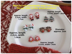 Close-up of resin Christmas earrings showing measurements for Santa, elk, and snowman
