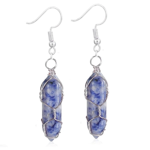 Detail of blue natural stone hexagon pendant earrings wrapped in silver wire
