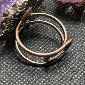 Detailed back view of vintage bronze adjustable ring with natural purple amethyst stone