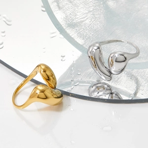 Irregular liquid style stainless steel open ring in gold and silver finish with water drops