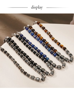 Detail of five men's natural stone beaded bracelets with tiger eye and stainless steel