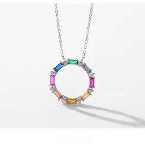 Macro view of geometric rainbow circle necklace with multi-color zircon pavé setting