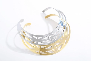 Detail of hollow star pattern metal chokers in gold and silver finish for women