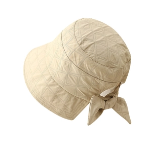 Women's autumn winter plaid bucket hat with rear bow and quilted pattern in beige