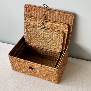 Set of 3 handmade rectangular seagrass storage baskets with lids and button closures