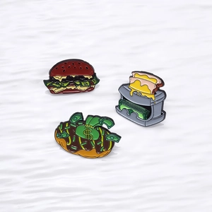 Three-piece fun enamel brooch set with money-themed burger, toaster and donut designs