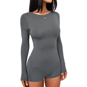 Detail shot of the form-fitting dark grey long sleeve romper in ribbed cotton fabric
