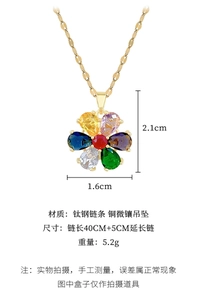 Macro detail of rotating flower pendant with multi-color crystals and titanium chain