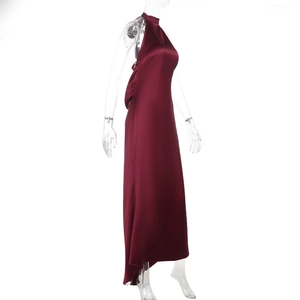 Side view of wine red satin halter dress on mannequin showing smooth glossy silk texture