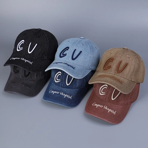 Detailed embroidery on vintage washed denim baseball caps in six assorted colors