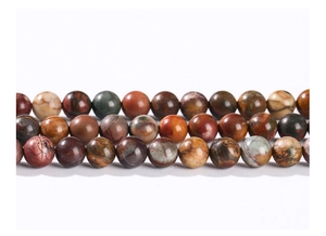 Macro view of polished round natural red pine beads with distinct textures and mixed colors