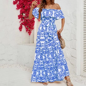 Detail of off-shoulder neckline and blue floral print on summer maxi dress