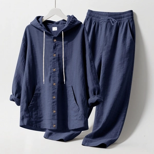 Detail of navy blue linen men's hoodie shirt and drawstring pants set in macro view