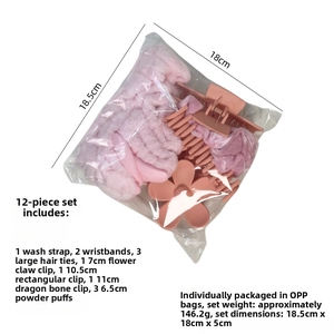 Pink 12-piece accessory set with soft headbands, matte claw clips, and makeup puffs