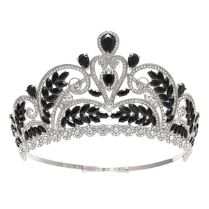 Detailed view of silver bridal crown with clear crystals and black marquise gemstones