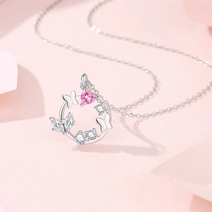 Elegant S925 silver necklace featuring a butterfly pendant with a pink heart zircon stone