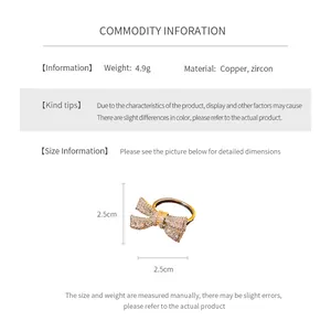 Detailed macro view showing the high-quality copper material and shiny zircon bow setting