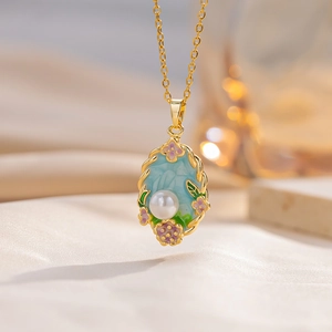 French retro enamel flower pendant necklace with light blue inlay and pearl detail