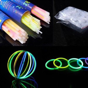Colorful glowing light sticks set with connectors for party bracelets and neon glow spheres
