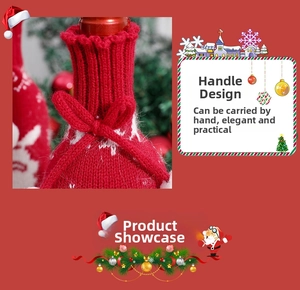 Close-up of knitted Christmas wine bottle cover featuring white reindeer motif and carry handle