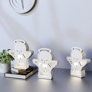 Three-piece set of white matte angel night lights with soft warm white LED glowing effect