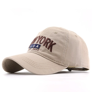 Cotton New York baseball cap in beige with brown embroidery and curved brim for unisex wear