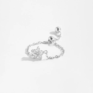 Detail view of S925 sterling silver adjustable pull chain ring with zircon flower