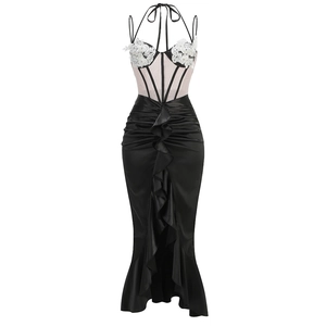 Slim fit evening gown with white floral embroidery bodice and black ruffled mermaid hem