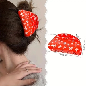 Red Christmas hair claw with reindeer and snowflake patterns, size 8cm with weight 29g