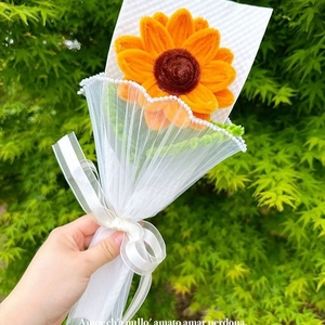 Handmade pipe cleaner sunflower bouquet with white mesh wrap for gift presentation